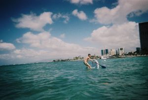 Paddle surfing